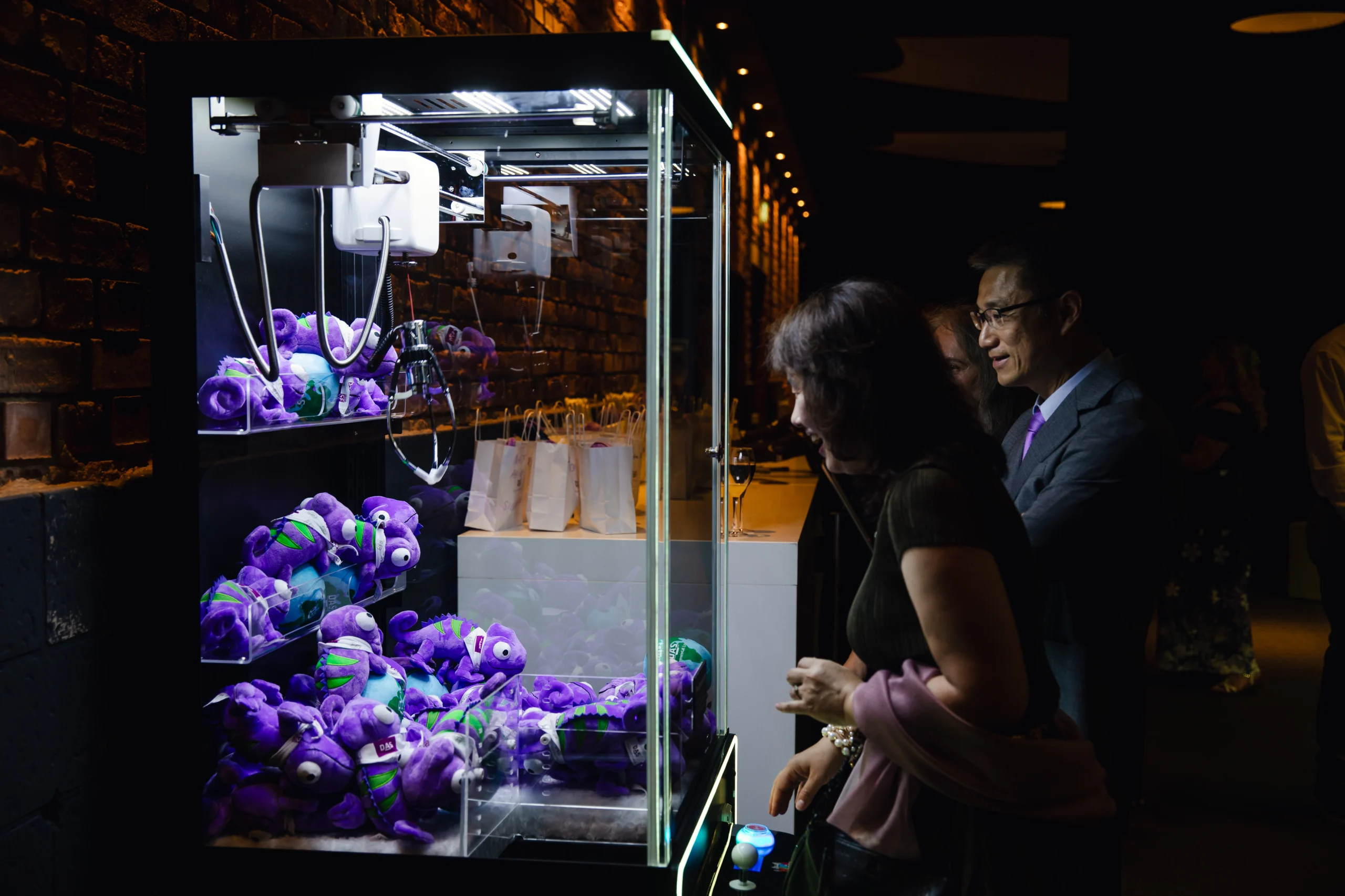 In Purple We Grow - Promo Bears USA Plush toys in vending machines — DAS Environmental Expert's Lizzy chameleon giveaway machine stocked with promotional plush toys by Promo Bears